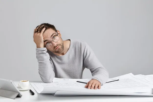 tired male illustrator being fatigue after drawing long time 273609 8456