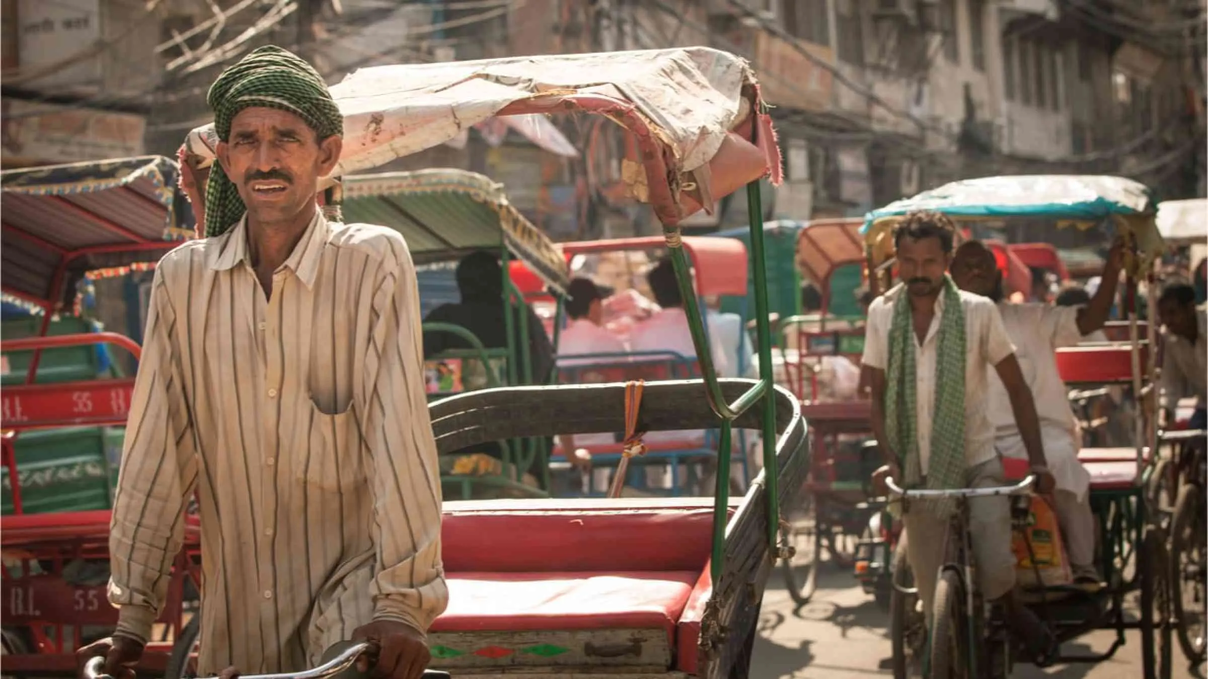Woman Helps Struggling Rickshaw Puller