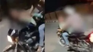 जिंदगी का न कोई रिस्क, युवक ने चलती बाइक पर प्रेमिका से लड़ाया इश्क- देखें VIDEO