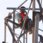 Men Climb Tower to Meet Lover