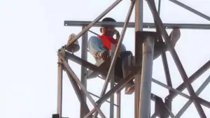 Men Climb Tower to Meet Lover